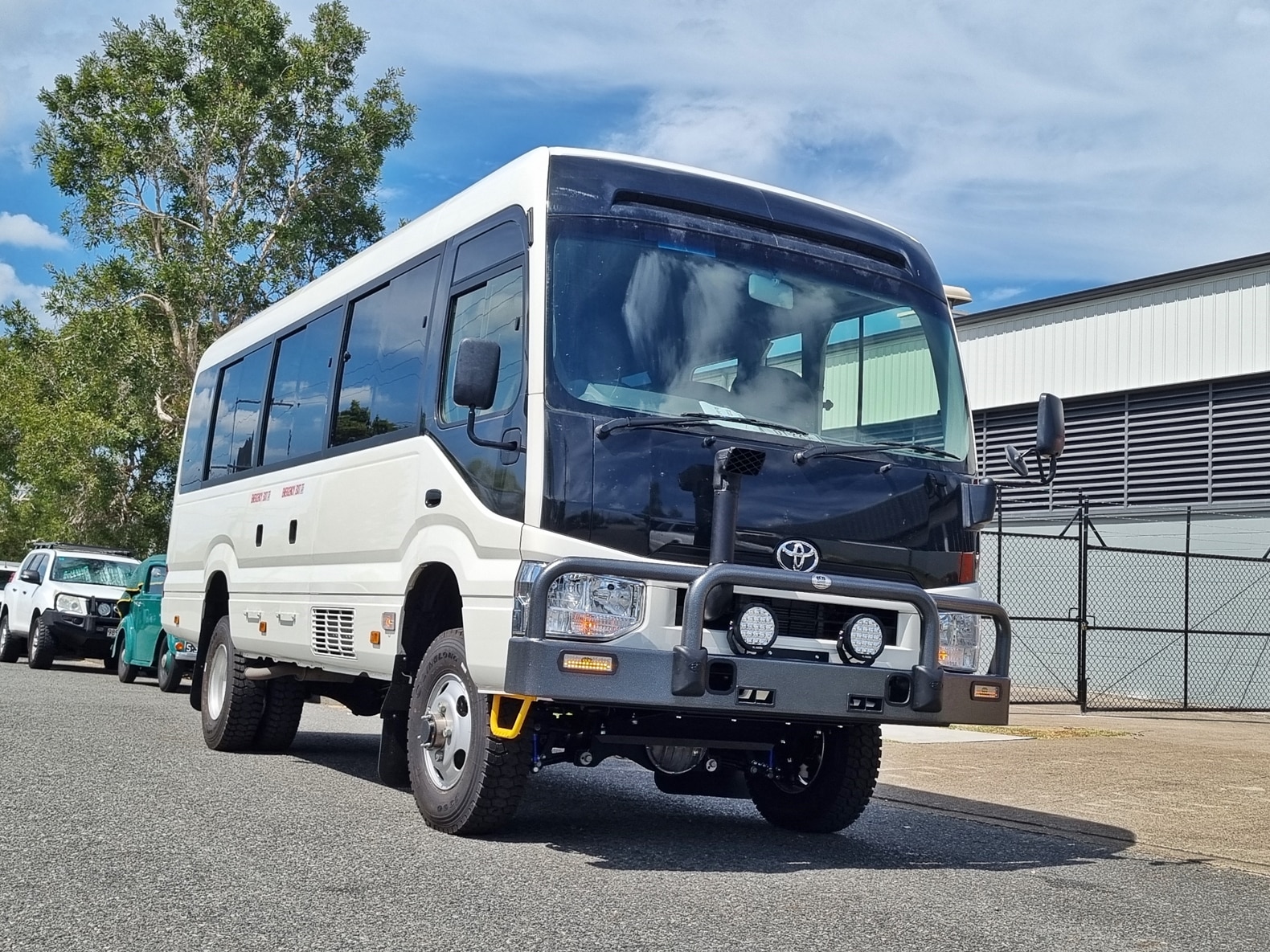 Bus 4x4 Conversion of Coaster with Wheelchair Lift 8 Wheelchair Coaster 1