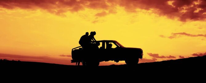 Four Wheel Drive Off Road Vehicles – Are They the Best Option? 3 People taking a 4WD off road | Featured image of the Four Wheel Drive Off Road Vehicles Blog by Bus 4x4 Group.